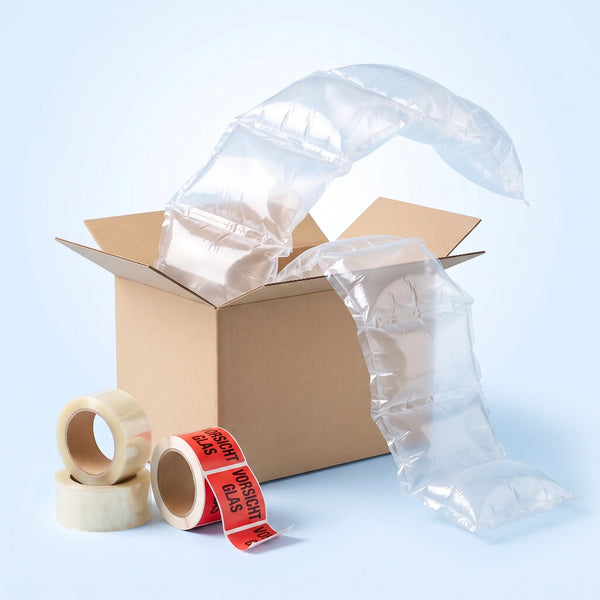 Verpackungsmaterial-Set im Karton: Luftpolsterkissen-Kette, drei Rollen transparentes Paketband und Vorsicht-Glas-Etiketten